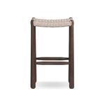 Outdoor bar stool with vintage white chunky box weave saddle seat and tapered dark wood legs