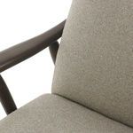 Detailed view of Jarvis Recliner seat and arm joint showing tight upholstery and dark wood finish