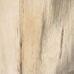 Close-up of whitewashed spalted wood grain texture on coffee table side panel