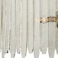 Close-up from beneath highlighting clustered antique brass bulb sockets inside chandelier