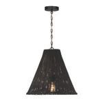 Black rattan pendant with bulb switched on showing warm ambient glow through weave