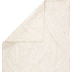 Ivory natural jute rug corner folded showing front and back weave texture