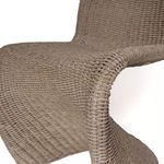 Close-up on side curve including edge of seat and vertical weave texture