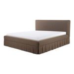 Zeppelin bed angled view showing rounded corners and pleated skirt detail