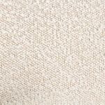 Zoomed detail of pillow fabric texture revealing off-white woven loops