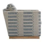 Allie Swivel Chair side view highlighting straight profile of arm and backrest with wooden swivel base