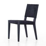 Villa Dining Chair angled view highlighting clean lines and black hair on hide material