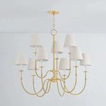 Amina Chandelier hanging in ceiling room context with visible white walls and subtle shadows