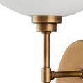 Close-up of the top white bone china cup and brass base with brushed finish
