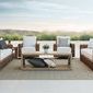 Havana seating group styled on patio with coordinating chairs, coffee table, and neutral pillows