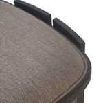 Top back corner close-up showing seat upholstery and two separated oak leg tops