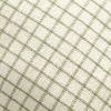 close-up showing detailed texture of moss green grid pattern on ivory fabric