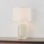 Leeston table lamp with oblong pill-shaped matte ceramic base in soft cream and simple white fabric shade