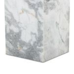 Corner close-up highlighting grey and white veining details with faint orange accents