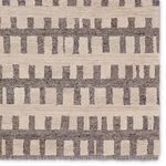 Top corner close-up highlighting broken stripe pattern and color contrast in wool fibers