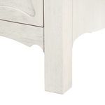 Close-up of Sara end table leg showing squared wood design and sailcloth finish texture