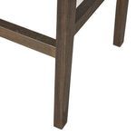 Close-up of lower wood frame corner showing dark stained teak leg and footrest