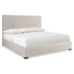 Upholstered Mason panel bed with buttonless tufted headboard, flange edges, and espresso-finished wood feet