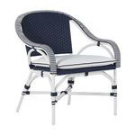 Outdoor accent lounge chair with navy woven seat and back, white frame, striped armrests, and white seat cushion