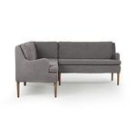 L-shaped dining banquette with curved arms, high back, gray flax linen upholstery, and tapered wood legs