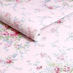 rolled wallpaper showing detailed print and smooth texture on soft pink background