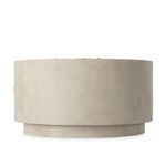 Side profile of fire table showing smooth concrete finish and round base supporting the structure