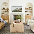 Soho Charcoal / Multi Rug in a warm-toned living room under a wood coffee table and fireplace