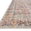 Angled view showing low pile texture and detailed pattern of Adrian Sunset Charcoal rug