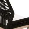 Detailed close-up focusing on black rope armrest wrapping and white fabric seat