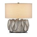 Weststrand Table Lamp with rugged gray cast concrete base featuring organic spoon-like swells and a beige drum shade