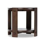 Low angle view highlighting open space between table tiers and pegged leg accents