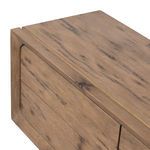 Top angled close-up showing grain and texture of oak veneer on media console