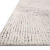 Low angled side view showing pile height and plush texture of the shag rug