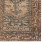 Detailed view of one corner highlighting intricate borders and color variation in the Southwestern design