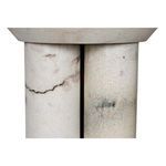 Close-up of two marble legs with natural dark gray and beige streak details