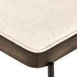 Close-up highlighting curved oak wood frame on chair back