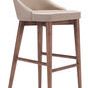 Moor Bar Chair with beige cushioned seat and back, dark wooden tapered legs and white piping detail