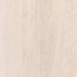 Close-up of natural light wood surface emphasizing smooth finish and grain pattern