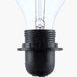 Clear incandescent light bulb mounted on brass socket and olive green ribbed ceramic base