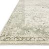 Close-up angled edge view showing Rosette Ivory Silver rug's low pile and color gradation