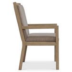 Side profile of Prado arm chair with darker wood and taupe fabric showing cushion thickness