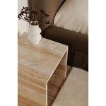 Bedroom corner with Rosa table placed beside bed, decorated with white vase and dried flowers.