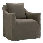 Rear view capturing rounded shape and floor-grazing slipcover hem on Noel Slip Swivel Chair