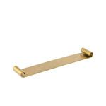 Aged brass tray angled showing curled ends and subtle texture on surface