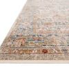 Low-angle side view showing rug’s pile texture and subtle color gradation along ocean blue border