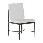 Repeated primary angle of chair showing white cushions and slim metal frame