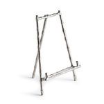 Silver easel with bamboo-like texture designed to hold platters or art, standing upright on three legs