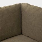Detail showing the corner join of the cushioned backrests and seat