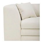 Close-up showing triple-layered seat cushion edge with soft fabric texture