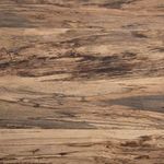 Close-up of spalted primavera wood grain details on table top with varied dark and light streaks